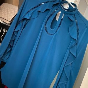 Blue blouse with ruffles